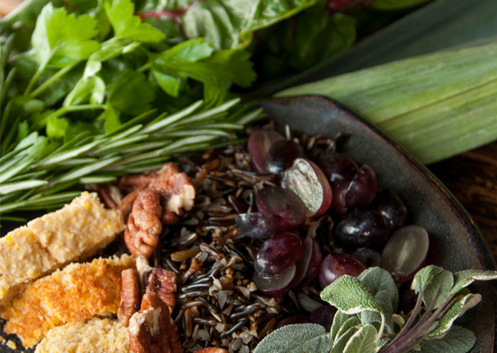 Fresh ingredients, such as bread, nuts, and grapes, used in our holiday stuffing recipe.
