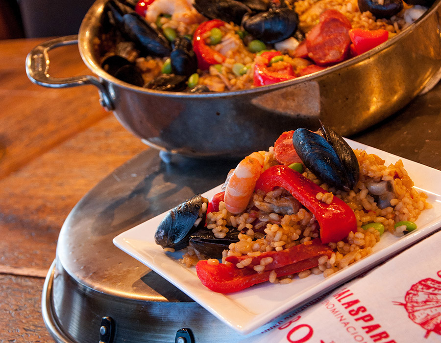 Steamy, warm seafood paella mixta is made special with bomba, a spectacular variety of short-grained rice.